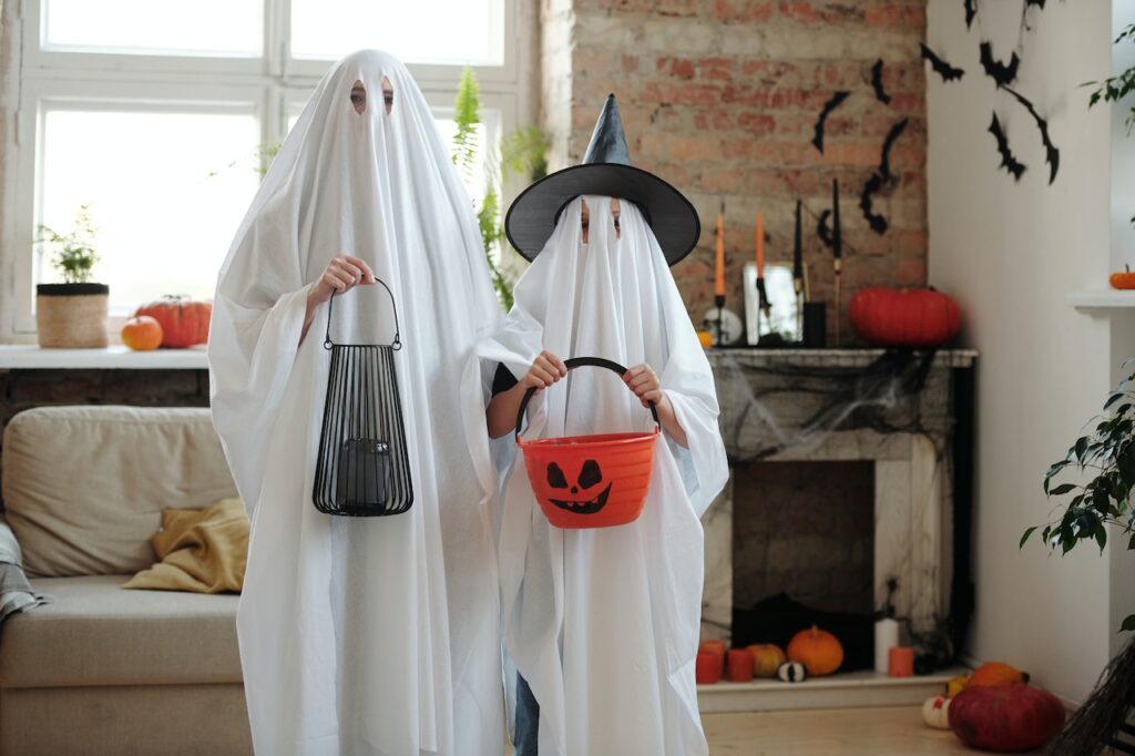 Dressing up as ghosts for Halloween