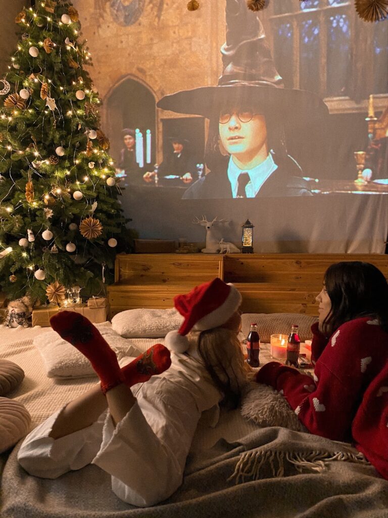 mother and kid watching Christmas movies